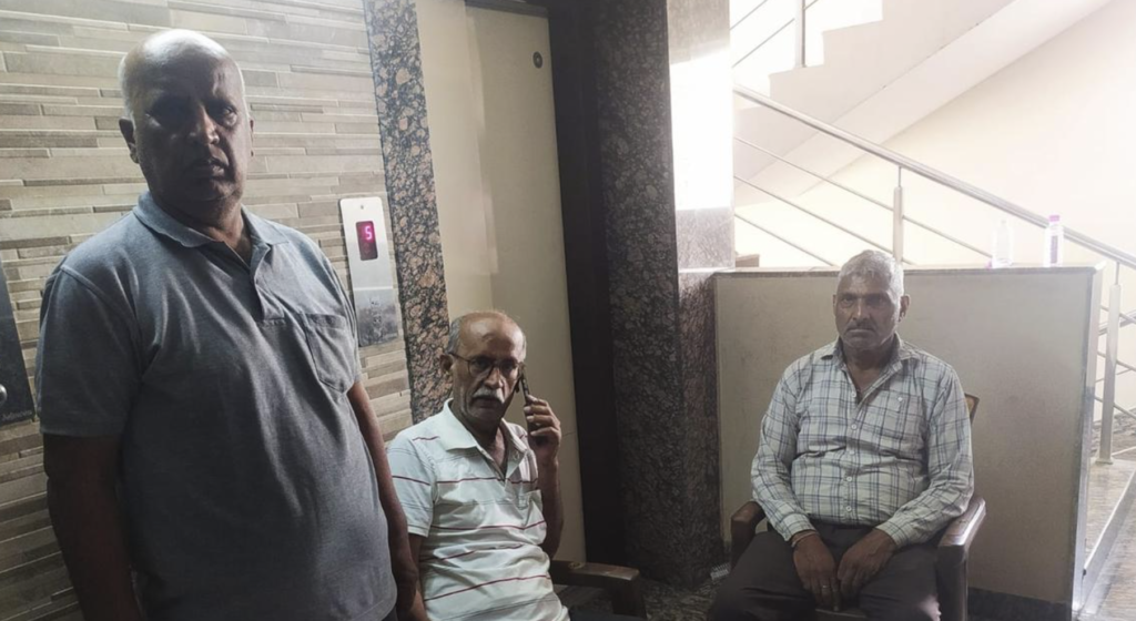 Family members of Neeraj Udhwani outside their flat at Model Town in Jaipur on Wednesday, April 23, 2025 | Photo Credit: Special arrangement.